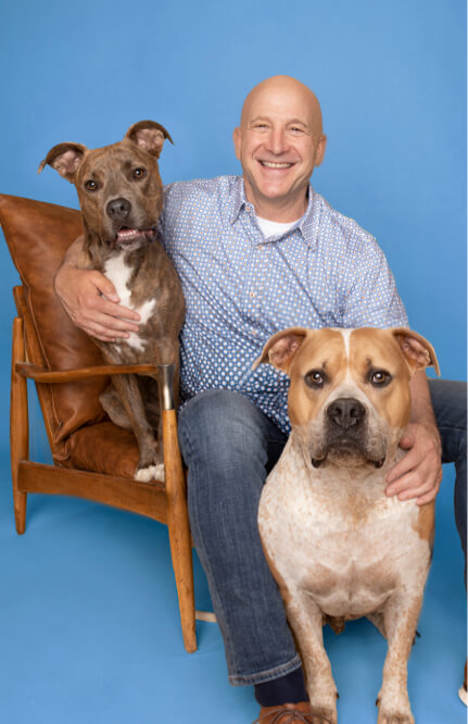 bob matteucci with two dogs